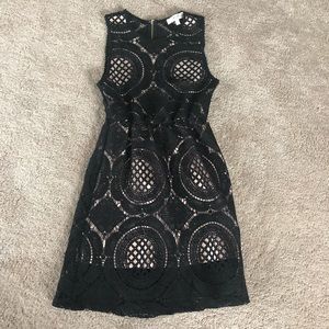 Size S black lace dress with beige underlay.